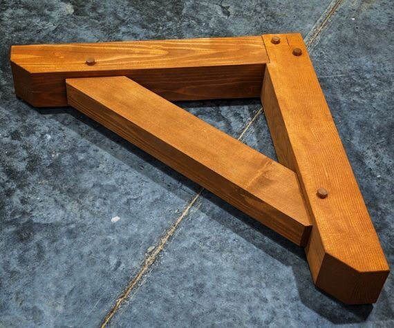 Timber bracket with a traditional design, crafted from solid wood for structural support and aesthetic appeal